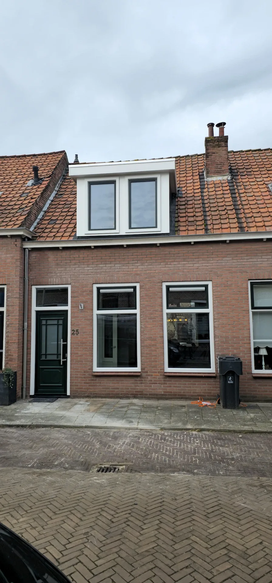 Voordeur kunststof kozijnen dakkapel